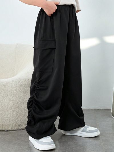SHEIN Kids EVRYDAY Tween Boy Casual Patch Pocket Loose Trousers