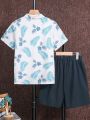 SHEIN Kids SUNSHNE Tween Boys' Plant Printed Shirt And Solid Color Shorts Set