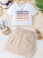 SHEIN Kids EVRYDAY Tween Girl's Letter Print T-Shirt And Solid Color Utility Skirt Set