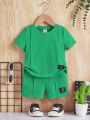 SHEIN Baby Boy Casual And Comfortable Short Sleeve Top And Shorts Set With Letter And Plaid Pattern
