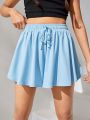 SHEIN Teenage Girls' Knit Solid Color Sports Skirt With Anti-Light Inner Shorts