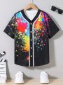 SHEIN Kids SPRTY Tween Boys' Loose Fit Sports Short Sleeve Woven Shirt With Colorful Ink Splash Pattern