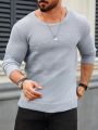 Men's Solid Color Loose Fit Casual Sweater With Round Neck