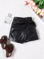 SHEIN Kids CHARMNG Little Girl'S Woven Solid Color Knotted Side Wrap Pu Leather Casual Short Skort