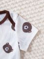 SHEIN Baby Boys' Cartoon Bear Printed Color-block Bodysuit + Cap + Bib Set