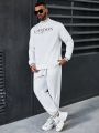 Manfinity Homme Men'S Plus Size Monogram Long-Sleeved Sweatshirt And Trousers Two-Piece Set