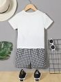 SHEIN Kids EVRYDAY Toddler Boys' Stylish Casual Two Piece Set With Printed Short-sleeved T-shirt And Plaid Shorts