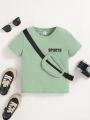 SHEIN Kids SPRTY Young Boys' Fitness Sports Round Neck Short Sleeve T-Shirt With Pocket