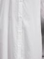 SHEIN Kids Nujoom Big Girls' Loose Solid Color Long Sleeve Shirt Dress With Loose & Curved Hemline