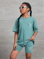 SHEIN Kids Cooltwn Tween Girls' Knitted Loose Fit Letter Print Round Neck T-Shirt + Slim Fit Shorts Sports Tracksuit