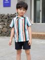 SHEIN Kids KDOMO Toddler Boys' Striped Printed Shirt And Solid Color Shorts Set