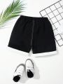 SHEIN Toddler Boys' Loose Fit Casual Color Block Shorts With Contrast Stitching