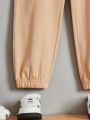 SHEIN Tween Boys' Casual Comfortable Loose Solid Color Sweatpants