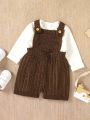 Infant's Sweater Romper With Bow Decoration