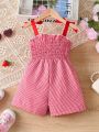 SHEIN Kids SUNSHNE Young Girl's Cute Casual Strawberry Embroidery Cami Romper With Grid Tie And Bowknot Shoulder Straps For Summer
