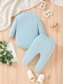 SHEIN Baby Boys' Casual And Comfortable Letter Pattern Printed Round Neck Long Sleeve Top And Long Pants Set For Home