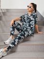 SHEIN Teenage Girls' Camouflage Texture T-Shirt And Slim Fit Jogger Pants Sporty Casual Set