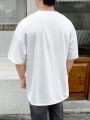 Manfinity EMRG Men's Slogan Sun Printed Short Sleeve T-Shirt
