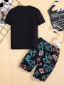 SHEIN Tween Boys' Tight-Fitting Casual Round Neck Short Sleeve T-Shirt With Glow-In-The-Dark Print And Shorts Homewear Set