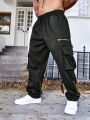 Manfinity LEGND Men's Plus Size Loose Straight Pants With Flip Pocket