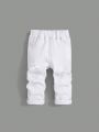 SHEIN Baby Boy Solid Color Distressed Denim Pants
