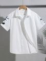 SHEIN Kids EVRYDAY Tween Boys' Loose Fit Casual Turn-Down Collar Printed Short Sleeve Woven Shirt With Letter Pattern