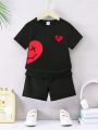 SHEIN 2pcs/Set Baby Boys' Casual Face Pattern Printed Short Sleeve T-Shirt And Shorts, Spring/Summer
