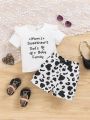 SHEIN Infant Girls' Casual Letter Printed Top With Ruffle Detailing And Cow Print Shorts Set