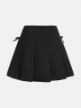 SHEIN Teen Girls' Cross Strap Ribbon Bowknot & Pleated A-Line Skirt