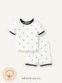 Cozy Cub Baby Boy Snug Fit Pajamas Set Of 4, Including Contrasting Anchor Pattern Short Sleeve Round Neck Top And Casual Shorts For Home Wear