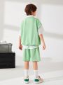 SHEIN Tween Boys' Casual Solid Color Vest, Knitted Collared Shirt And Shorts Set, Knitted Vest & Button Down Short-Sleeved Shirt 3pcs/Set