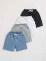 SHEIN Kids EVRYDAY 4pcs Young Boy Casual Sporty Elastic Waistband Street Style Shorts Set In White, Green, Blue And Black. Suitable For Daily, School, Sports, Spring And Summer.