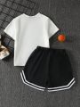 SHEIN Kids SPRTY Boys Letter Graphic Tee & Striped Trim Track Shorts