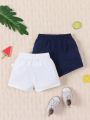 2pcs Baby Boys' Leisure Comfortable Practical Simple Solid Pocket Detail Shorts