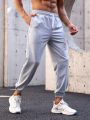 SHEIN Fitness Men's Sports Pants With Drawstring Waist And Diagonal Pockets