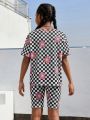 SHEIN Kids SUNSHNE 2pcs/Set Vacation Style Checkboard Cartoon Printed T-Shirt With Shorts Set For Tween Girls