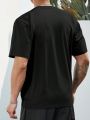 Manfinity Loose-Fit Men's Plus Size Astronaut Print T-Shirt With Drop Shoulder