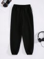 SHEIN Kids KDOMO Boys' Letter Printed Sweatpants With Side Seams & Woven Tapes, Elastic Cuffs, Youth