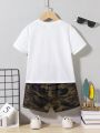 SHEIN Kids QTFun Toddler Boys' Comfortable Casual Father'S Love Theme Printed Short Sleeve Top And Camouflage Printed Shorts Set