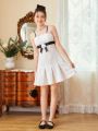 SHEIN Teen Girls' Woolen Strap Dress With 3d Flower & Bow Embellishment