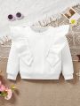 SHEIN Kids CHARMNG Young Girl Solid Color Round Neckline Loose-Fit Casual Sweatshirt With Ruffle Hem