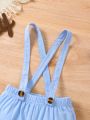 Baby Boy's Pure Blue Textured Suspenders Shorts With Folded Hem And Bow Tie