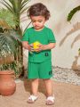 SHEIN Baby Boy Casual And Comfortable Short Sleeve Top And Shorts Set With Letter And Plaid Pattern