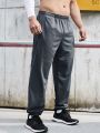 SHEIN Running Men's Solid Color Elastic Waist Jogger Pants With Slanted Pockets