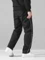 Manfinity EMRG Men's Plus Size Patchwork Striped Casual Pants