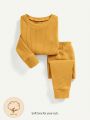 Cozy Cub Baby Boy Snug Fit Pajama, Round Neck Solid Color Top And Pants Set