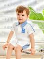 SHEIN 2pcs/Set Infant Boys' Leisure Polo Shirt And Shorts Set For Daily Wear And Outdoor Activities. Suitable For Spring And Summer.