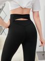 SHEIN Teen Girls' Knitted Pure Color Back Cross Hollow Out Casual Leggings