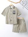 SHEIN Kids EVRYDAY Tween Boys' Loose Fit Casual All Over Print Short Sleeve Shirt And Shorts 2pcs/Set