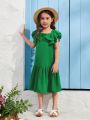 SHEIN Kids EVRYDAY Young Girls' Woven Solid Color Loose Fit Casual Dress With Ruffled Hemline